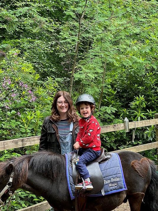 William sat on a pony with his Mummy at Center Parcs.